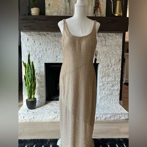 Aidan Mattox: Light Gold, scoop neck and back beaded full length beaded dress.